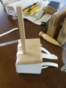 Attaching the boards by inserting pegs